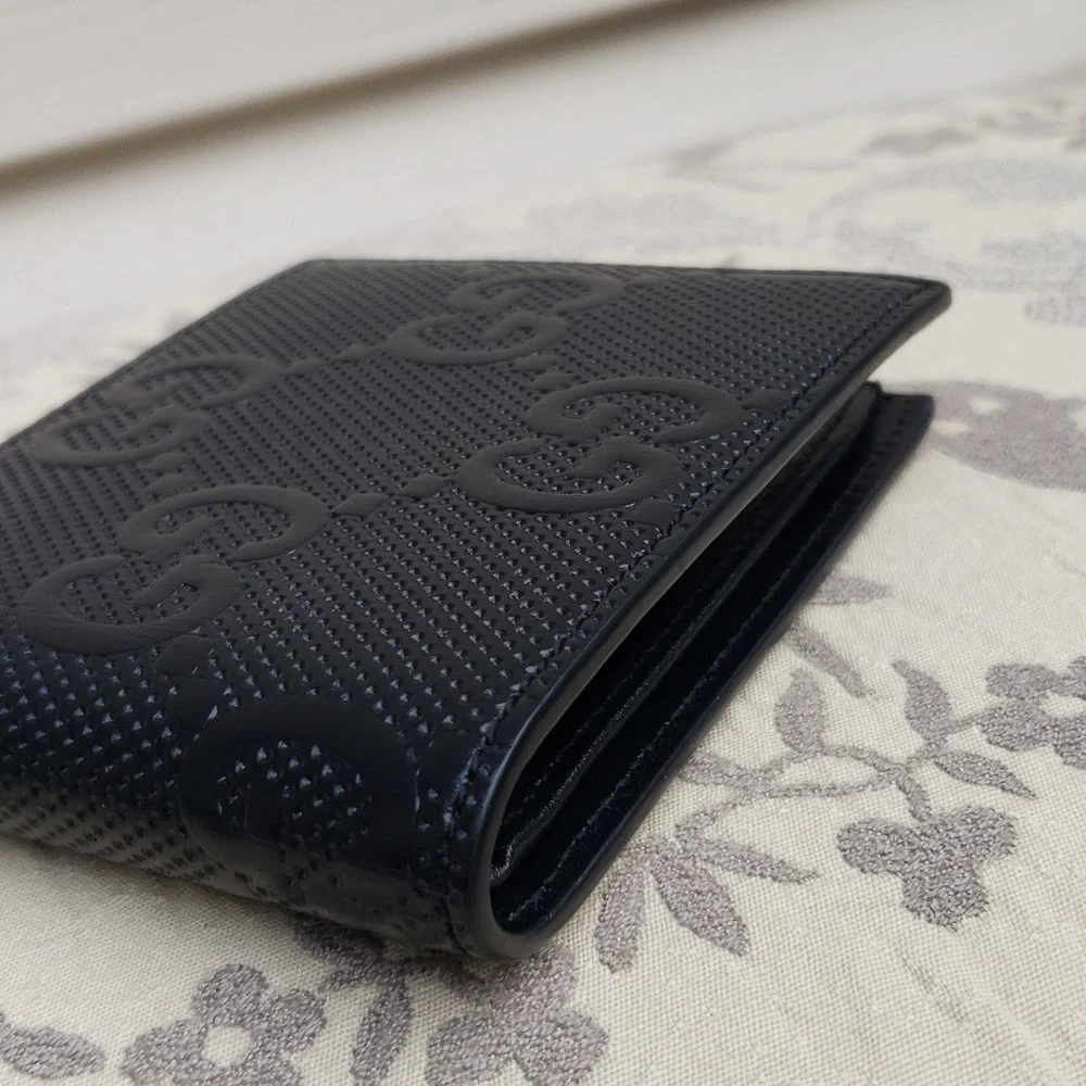GUCCI GG EMBOSSED LEATHER MEN'S BIFOLD WALLET